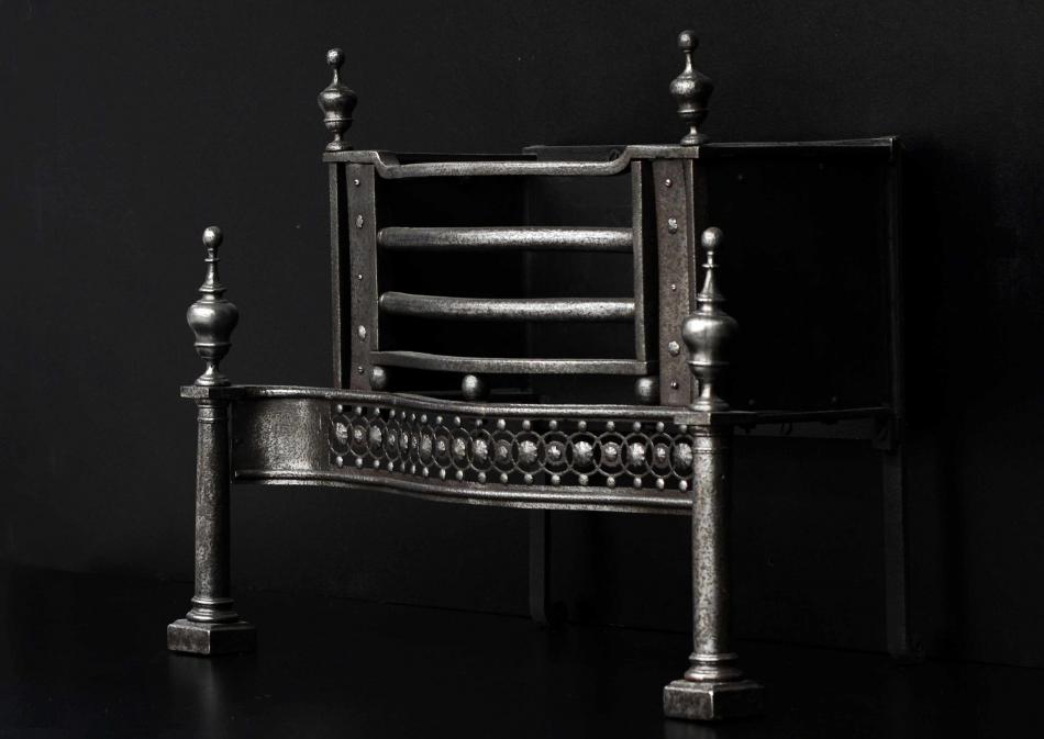 A period 18th century polished steel firegrate