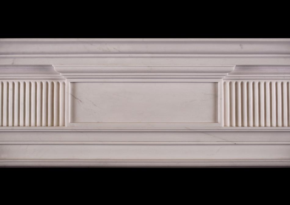A George II style white marble fireplace