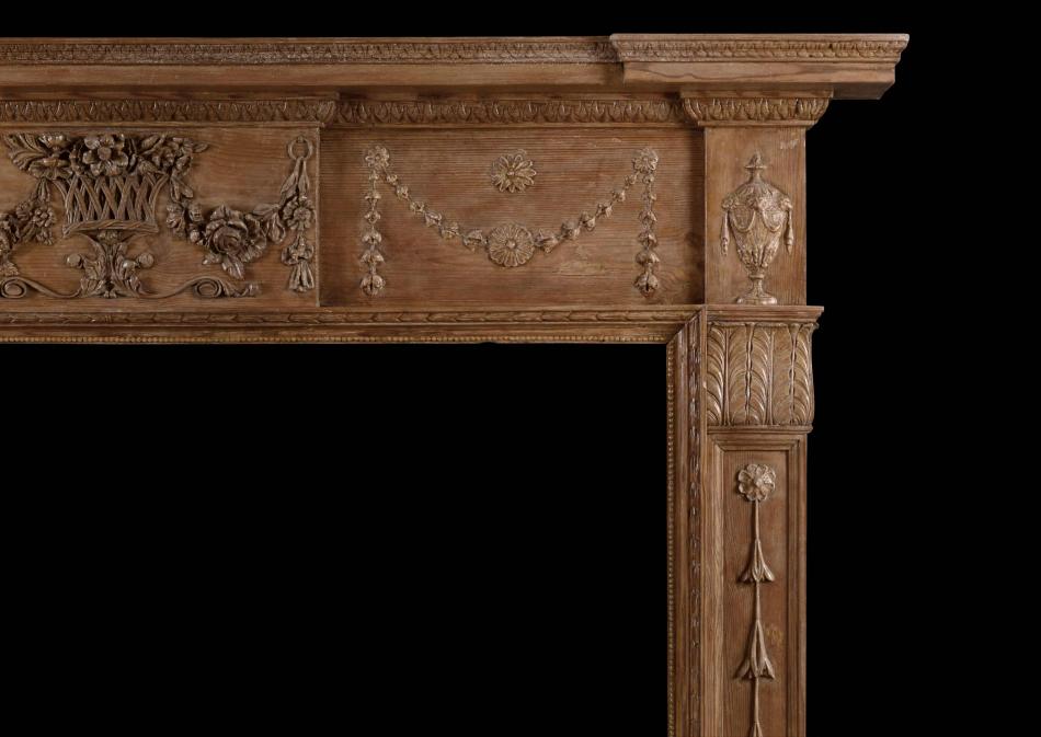 An English pine and gesso antique fireplace