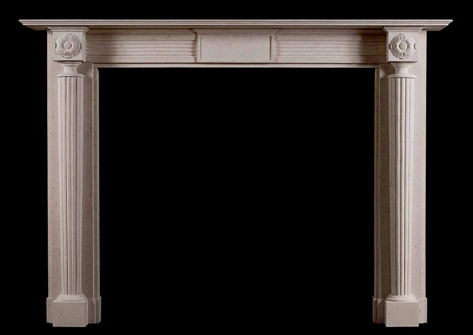 An English, Regency style fireplace in limestone