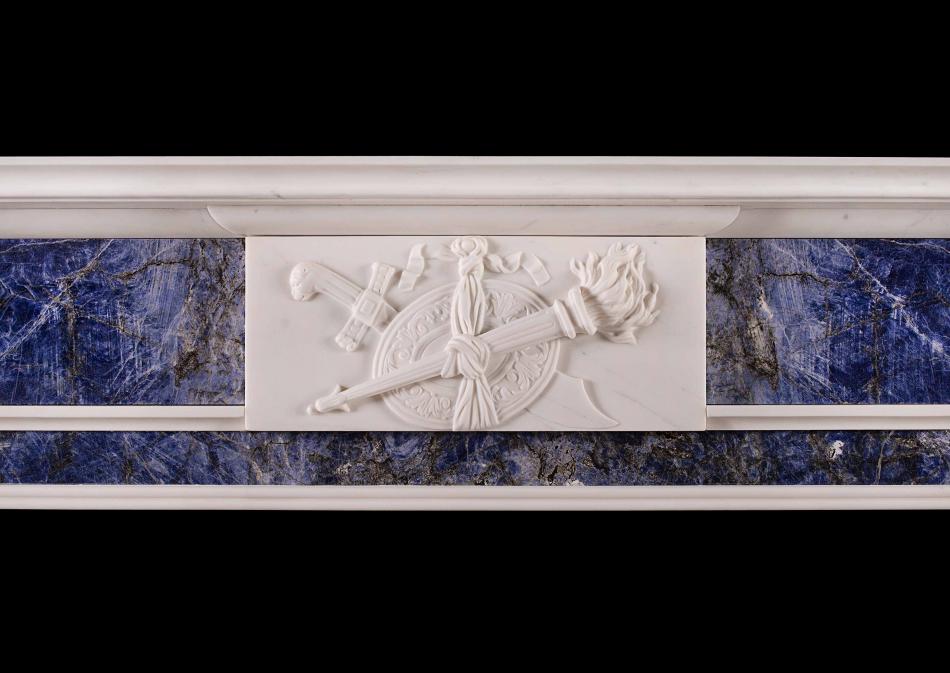 A late Georgian white marble fireplace with blue inlay