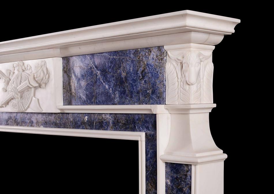 A late Georgian white marble fireplace with blue inlay