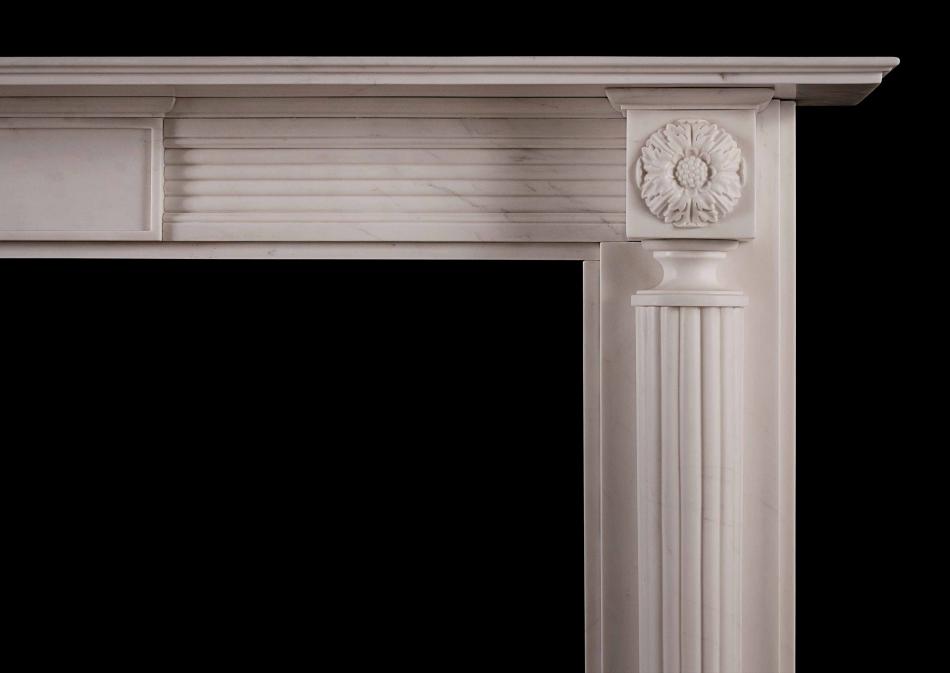 An English, Regency style fireplace in white marble