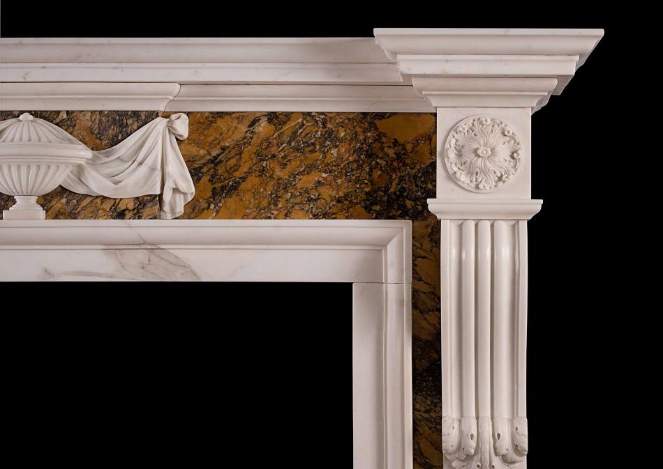 A Georgian style chimneypiece in Statuary and Siena marble