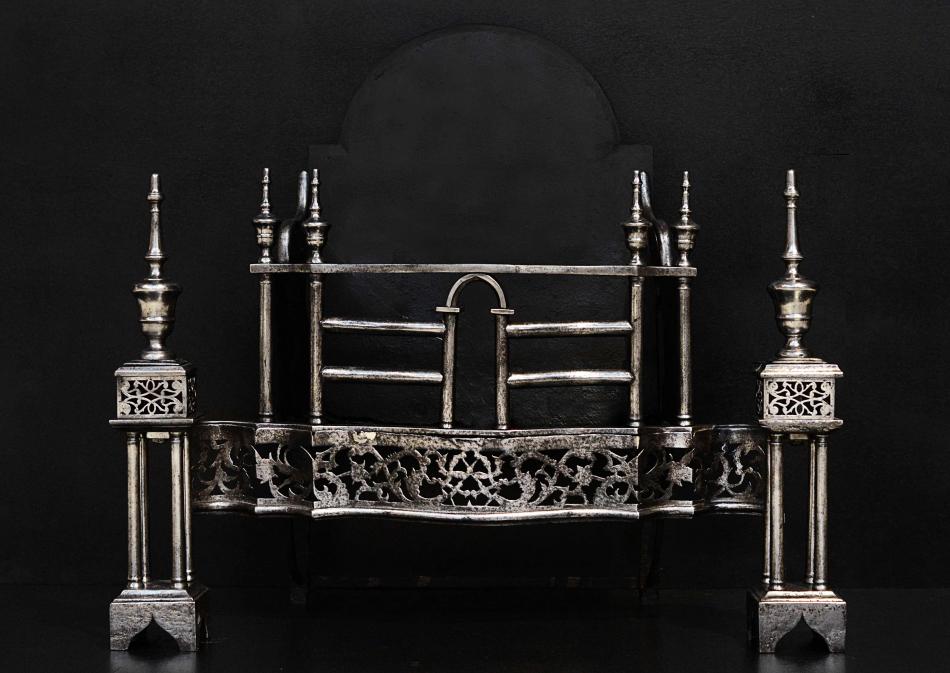 A period, mid Georgian steel firegrate in the manner of Thomas Chippendale