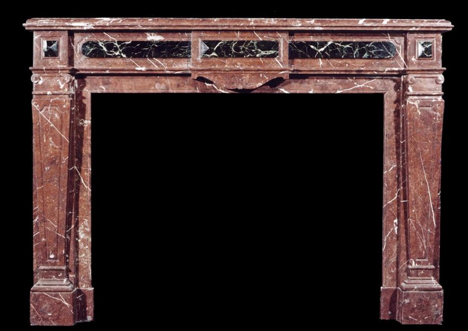 A French Louis XVI style Rouge Royale marble fireplace