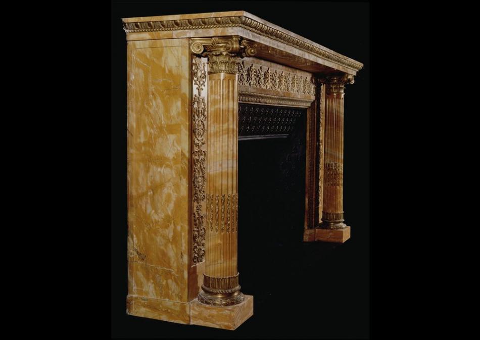 An important early French Napoleonic Empire Siena marble fireplace