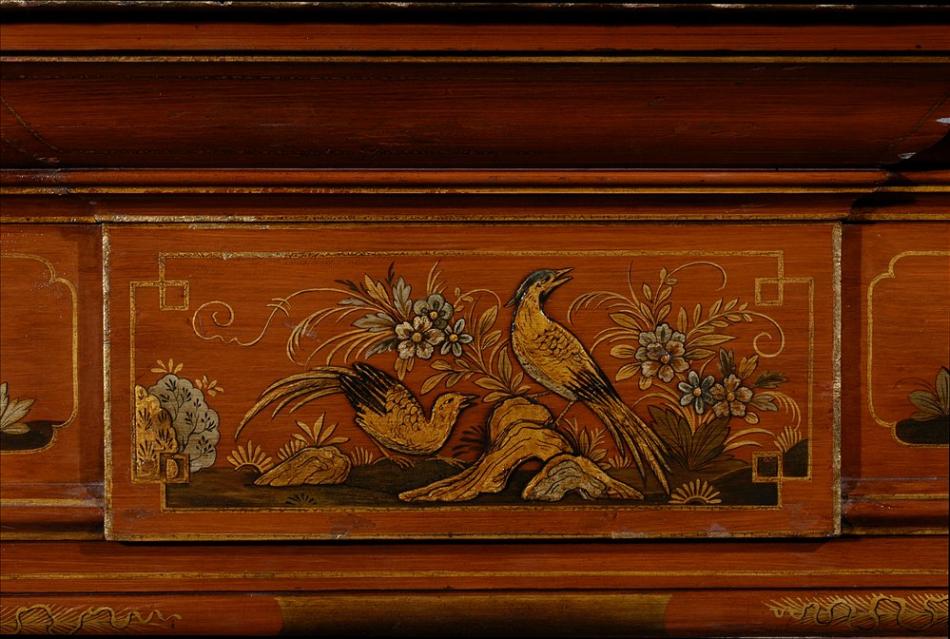 A 19th century English Japanned wood fireplace