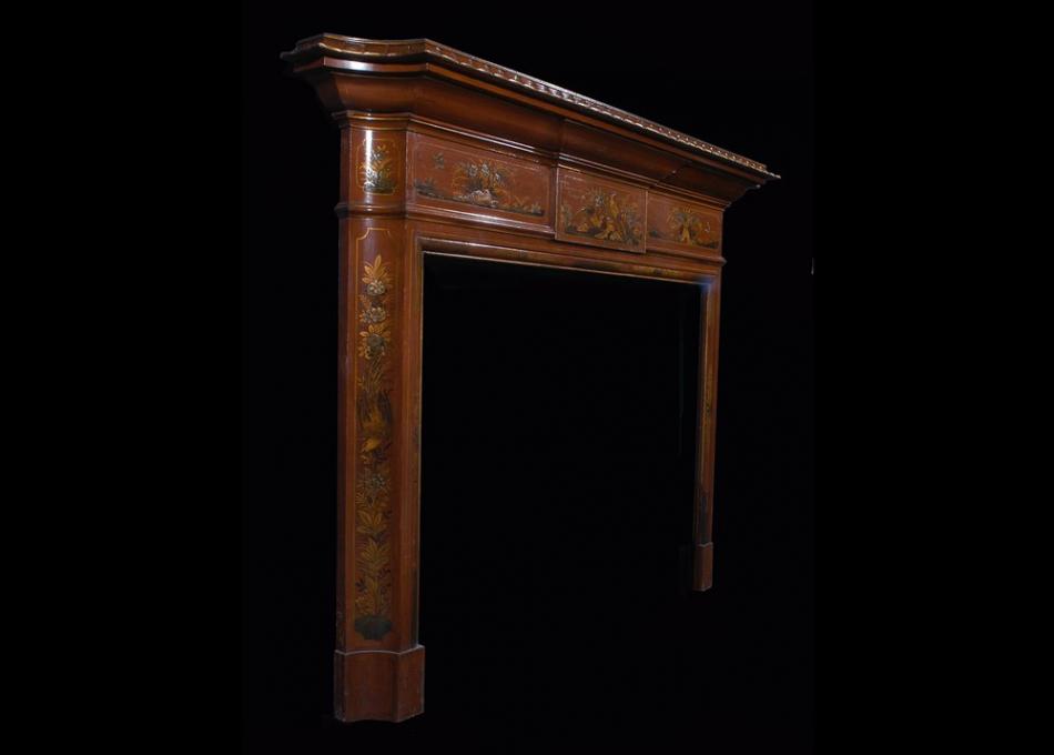 A 19th century English Japanned wood fireplace