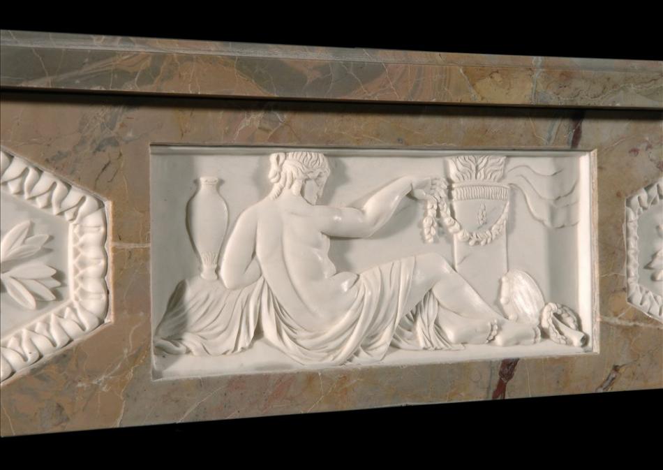 A Sarrancolin French Louis XVI style marble fireplace