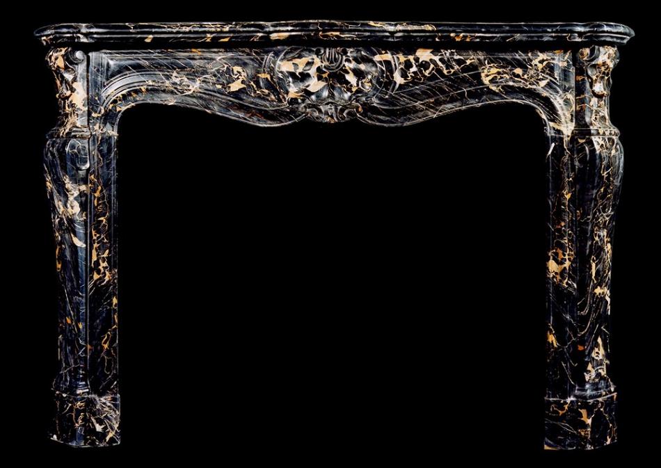 A 19TH CENTURY FRENCH LOUIS XV STYLE PORTORO MARBLE FIREPLACE