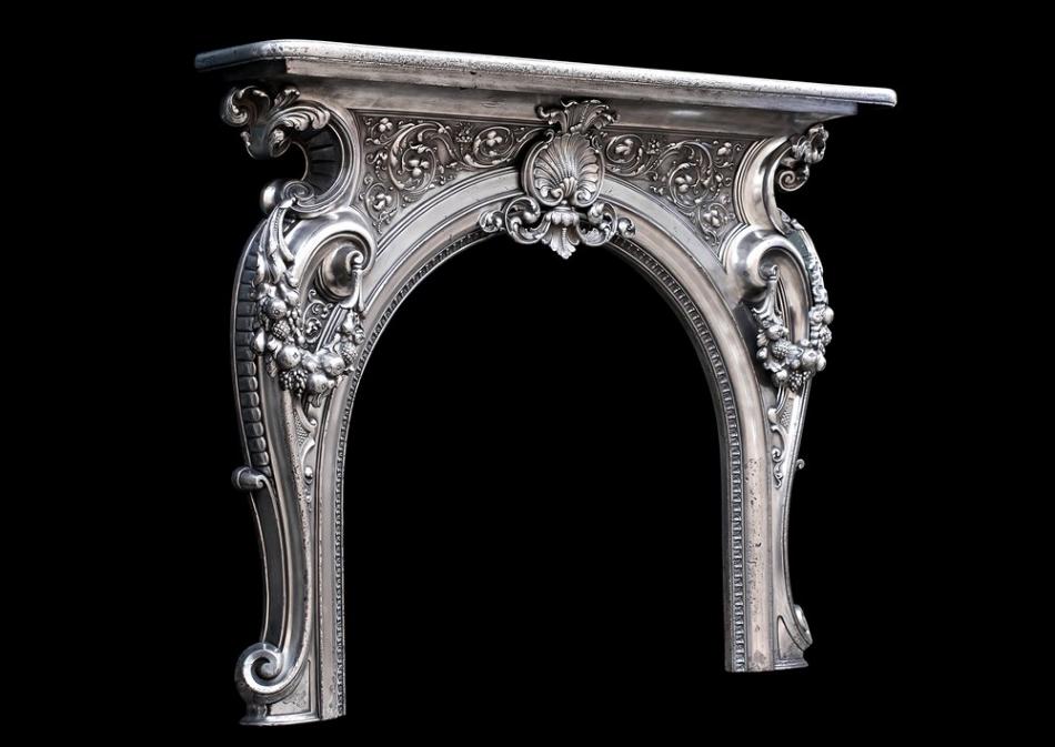 An ornate 19th century French cast iron fireplace