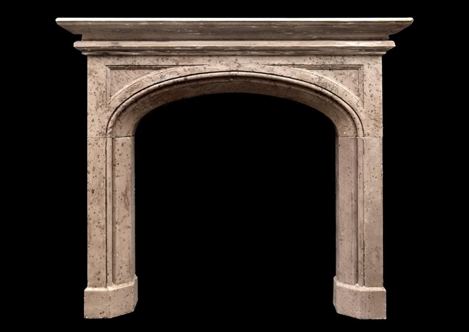 A 19th century English Gothic style stone fireplace