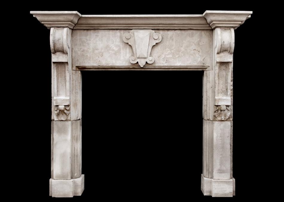 A large English limestone fireplace with shaped brackets (pair available)