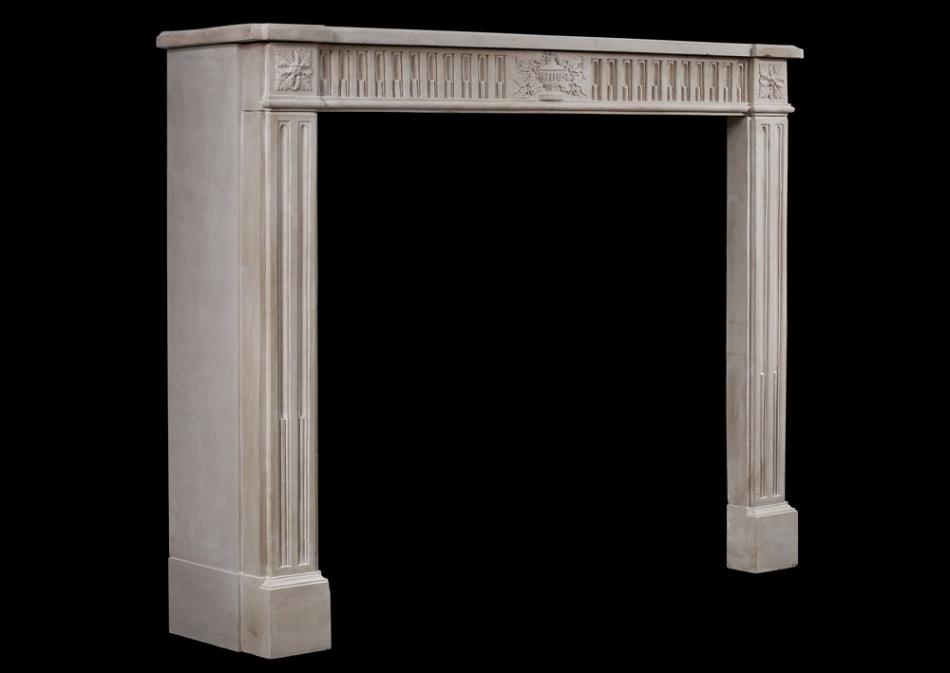 A fine quality period French Louis XVI style limestone fireplace