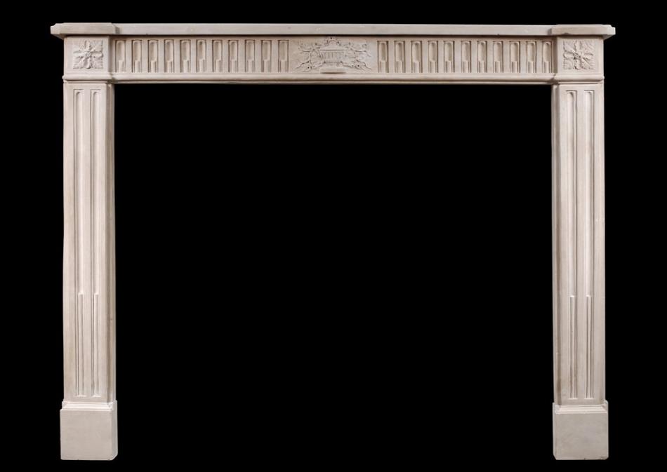 A fine quality period French Louis XVI style limestone fireplace