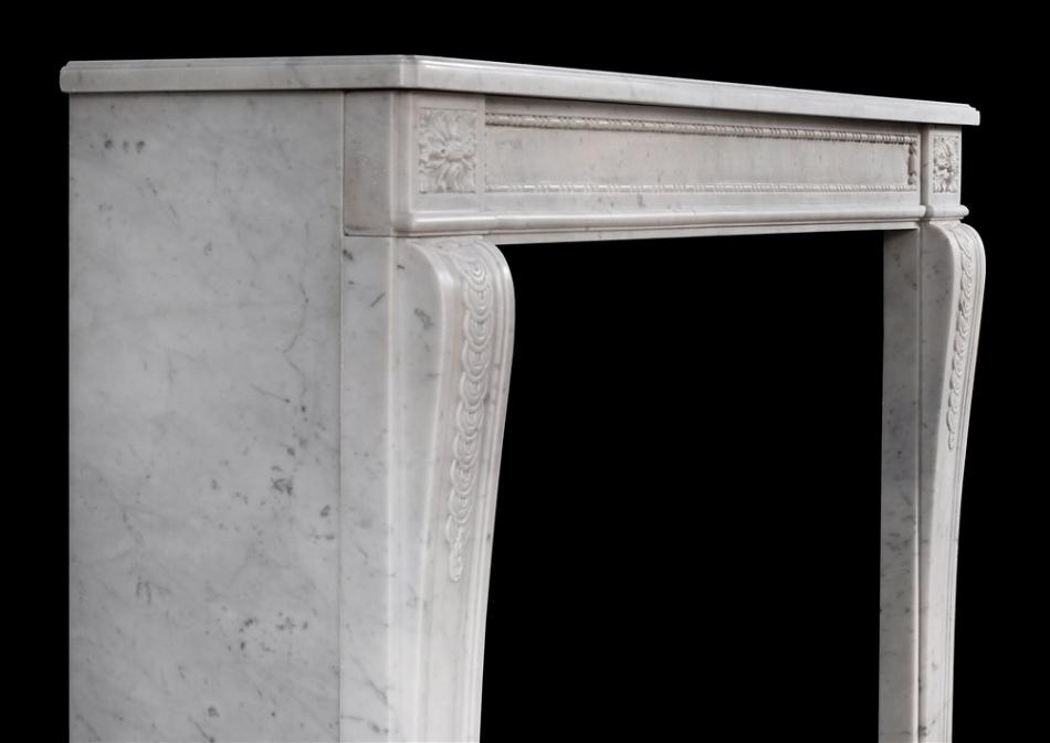 An early 19th century Antique French Louis XVI style Carrara marble mantel