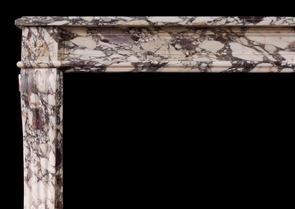 A fine quality Breche Violette marble fireplace
