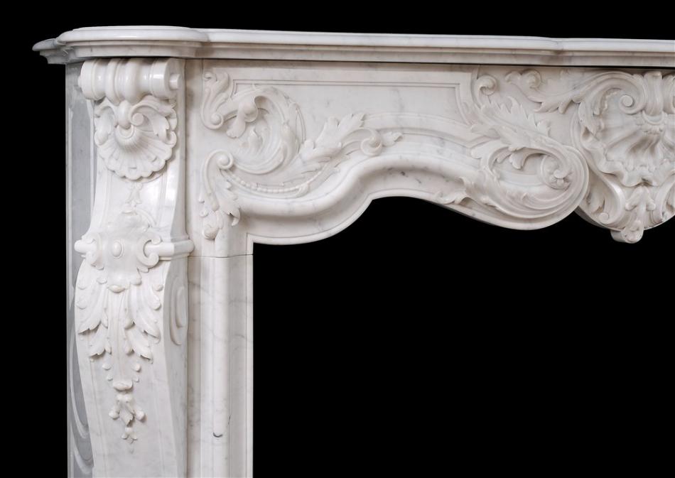 A fine quality French Louis XV style marble fireplace in Carrara marble