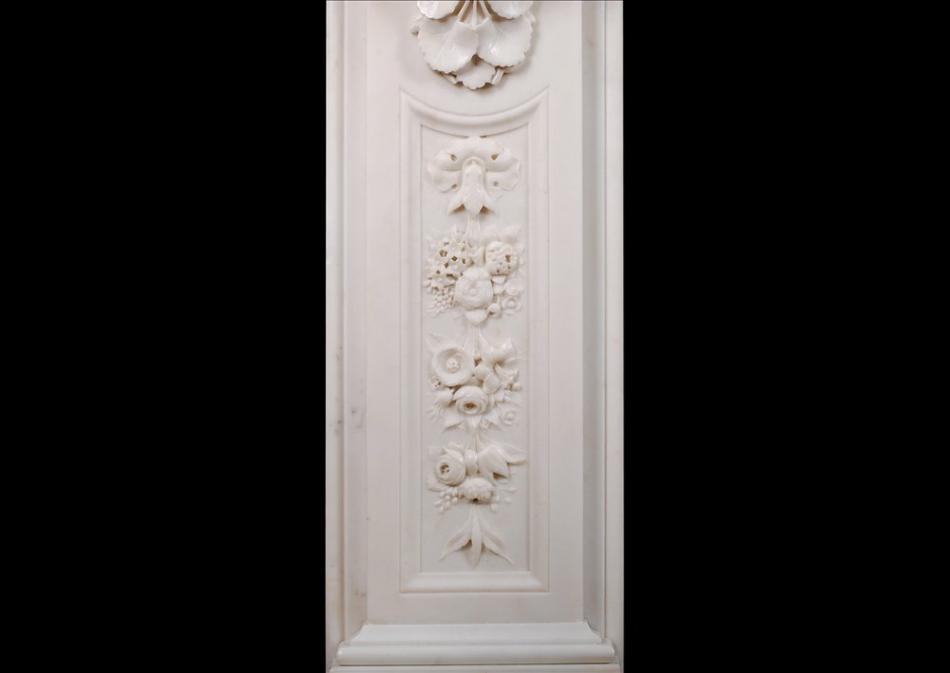 A well carved Victorian English Statuary marble fireplace