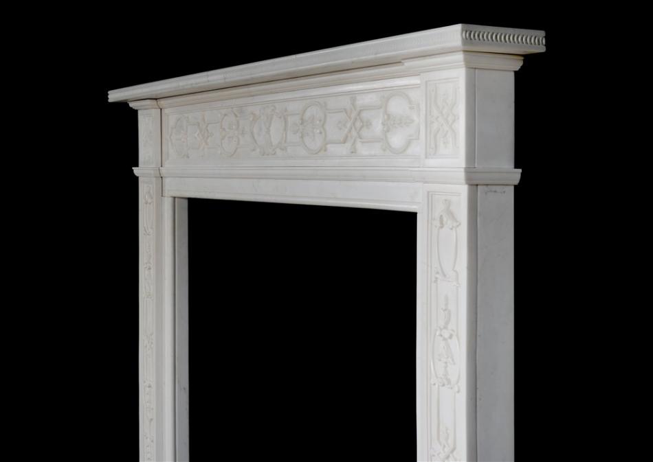 An 18th century style carved white marble mantel piece