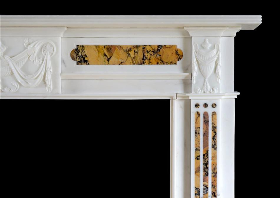 A late Georgian antique Statuary and Siena marble chimneypiece