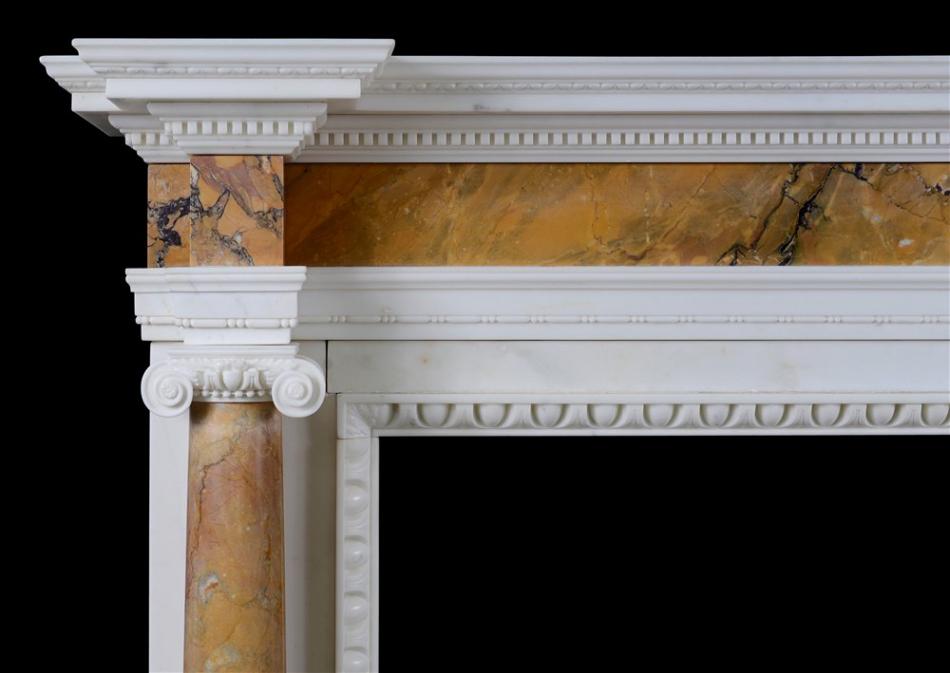 An English Statuary marble fireplace with Siena columns