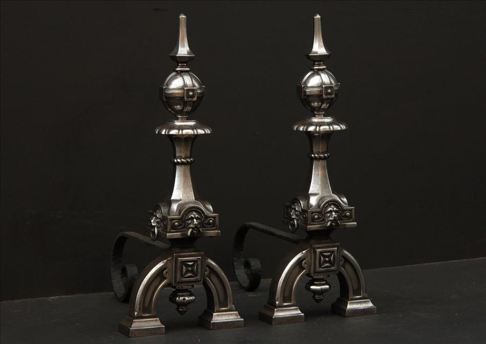 A pair of neo gothic steel firedogs