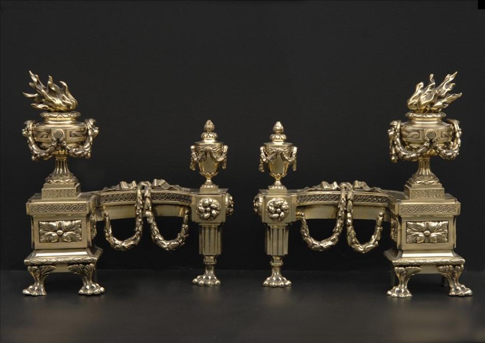 A very fine pair of decorative brass chenets