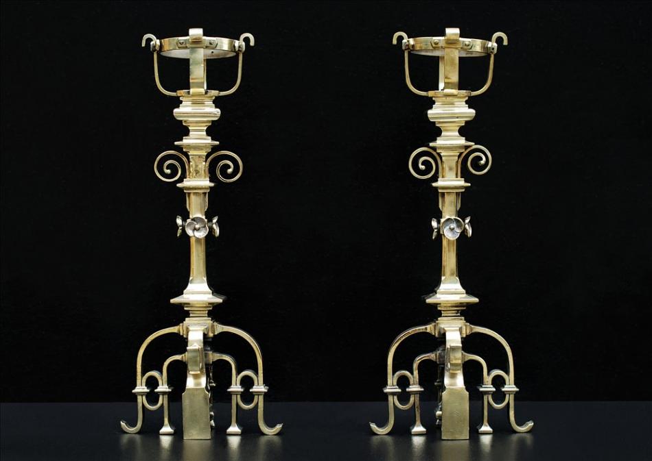 A pair of fine quality French Gothic Revival brass chenets