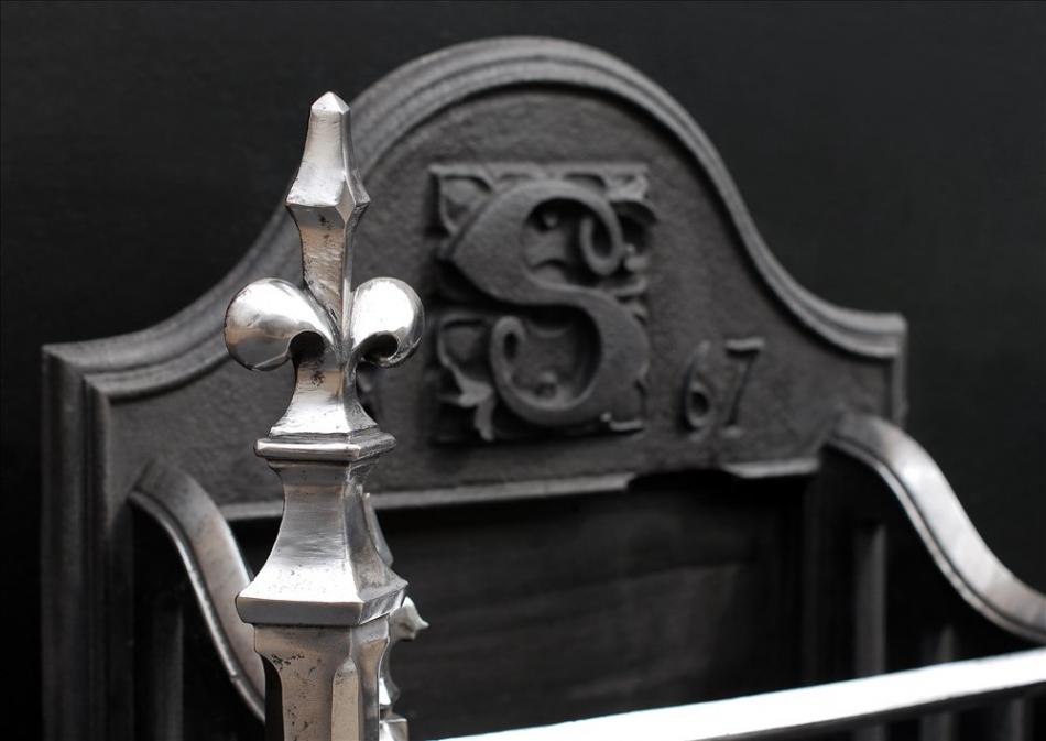 A mid 19th century neo-Gothic cast iron firegrate