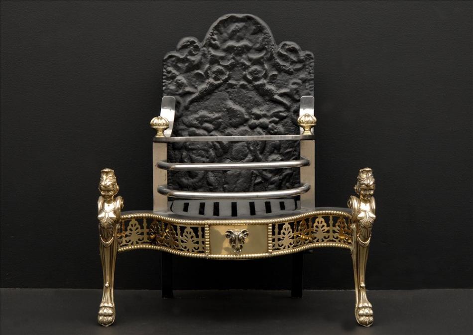 A 19th century Dutch steel and brass fire basket