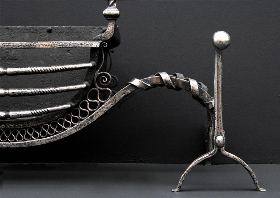 A very unusual late 18th century wrought iron firegrate