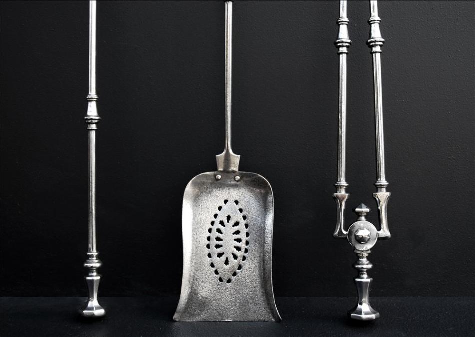 An elegant set of 19th century English steel firetools