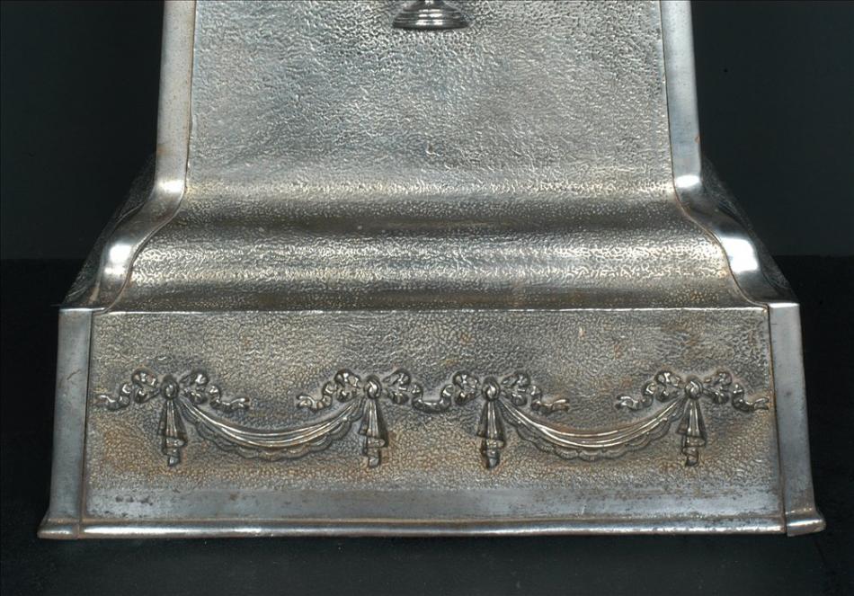 An English Polished Cast Iron Urn on Plinth