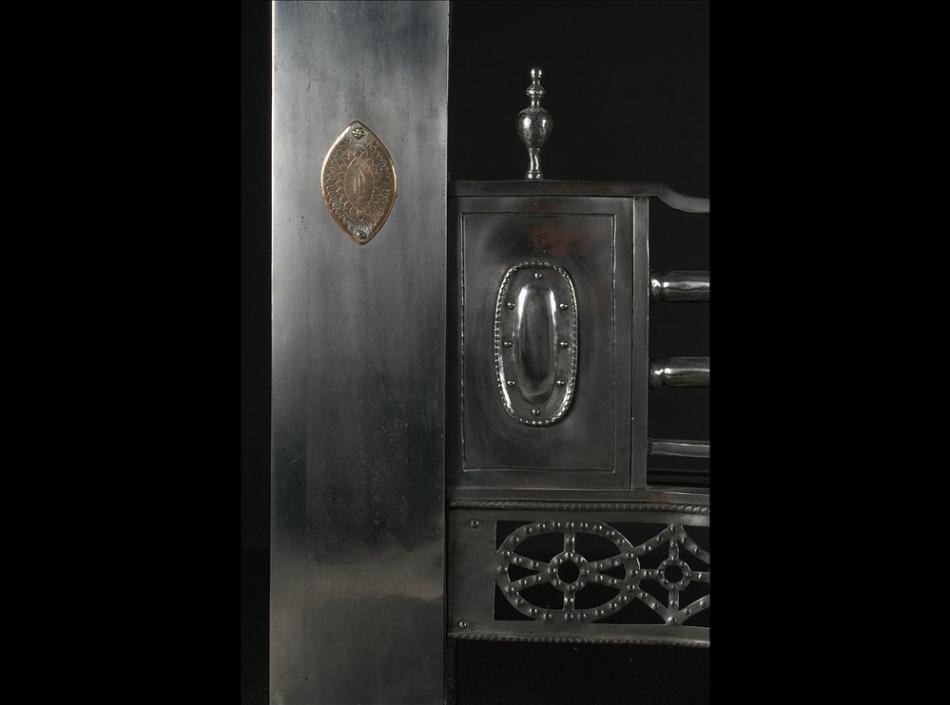 A 19th century English steel Register grate with gunmetal detailing