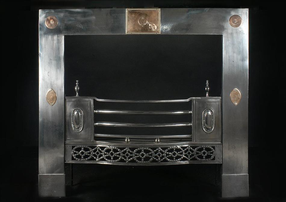 A 19th century English steel Register grate with gunmetal detailing
