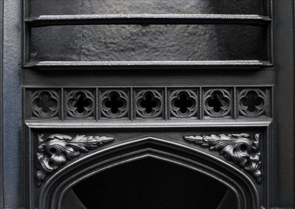 A 19th century cast iron hob grate in the Gothic style