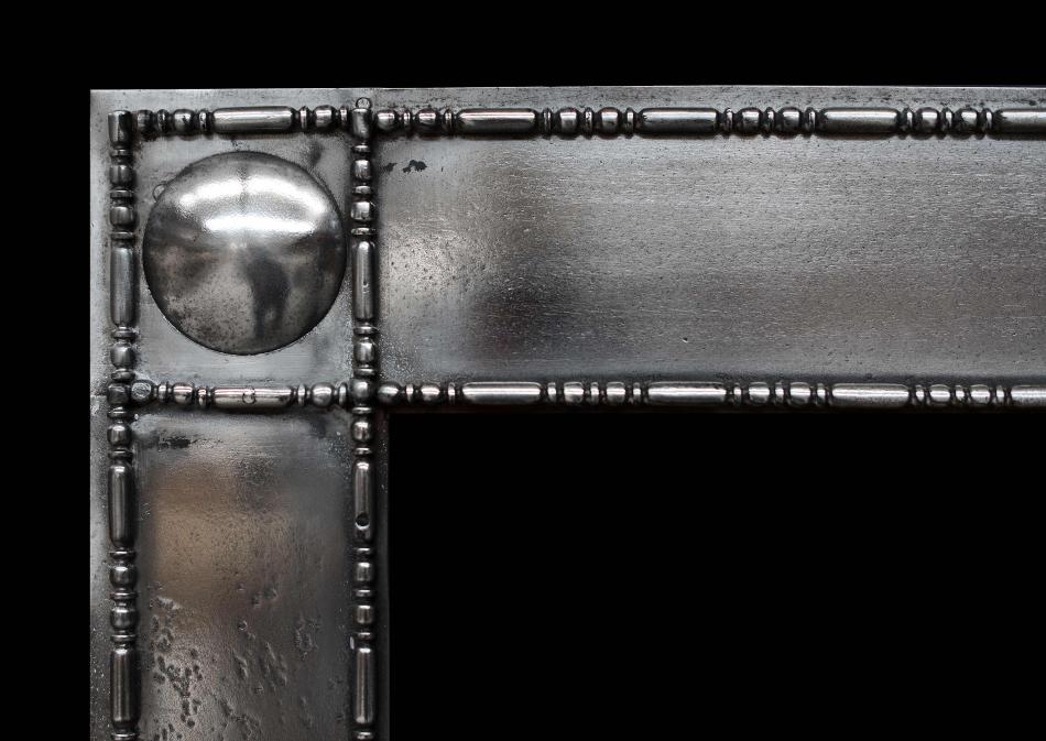 A Georgian style polished steel register grate