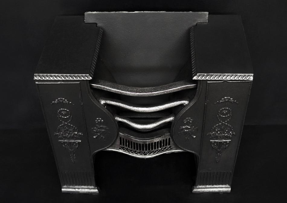 A Georgian style cast iron hob grate