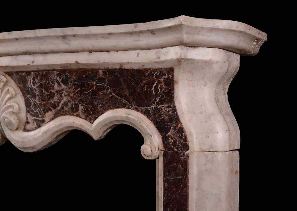 A small Italian Carrara and Rosso Levanto marble chimneypiece
