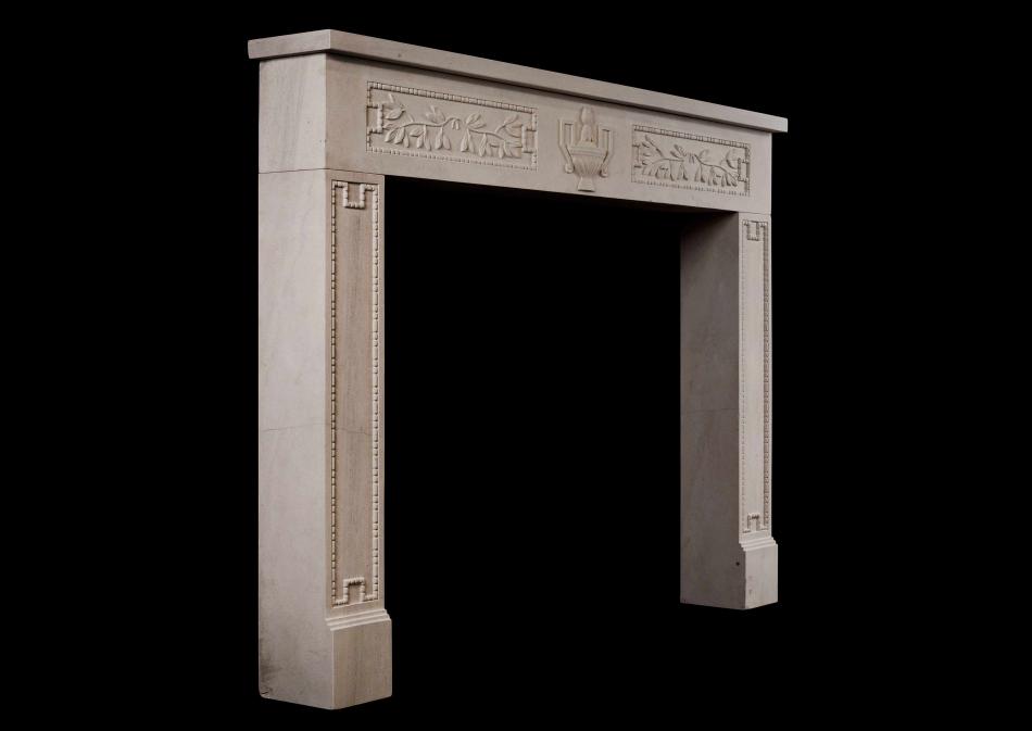 A rustic French limestone fireplace in the Louis XVI style