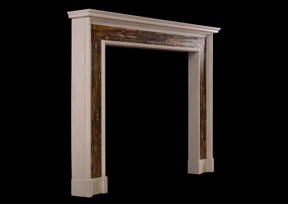 A white and Siena Brocatelle marble fireplace in the Queen Anne style