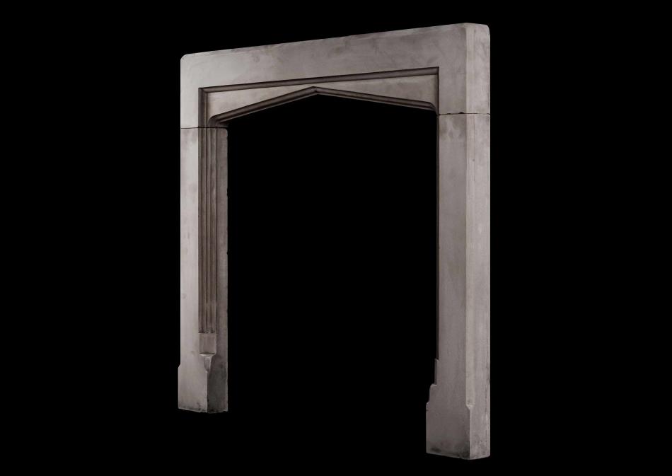 A small Gothic style fireplace in Purbeck stone