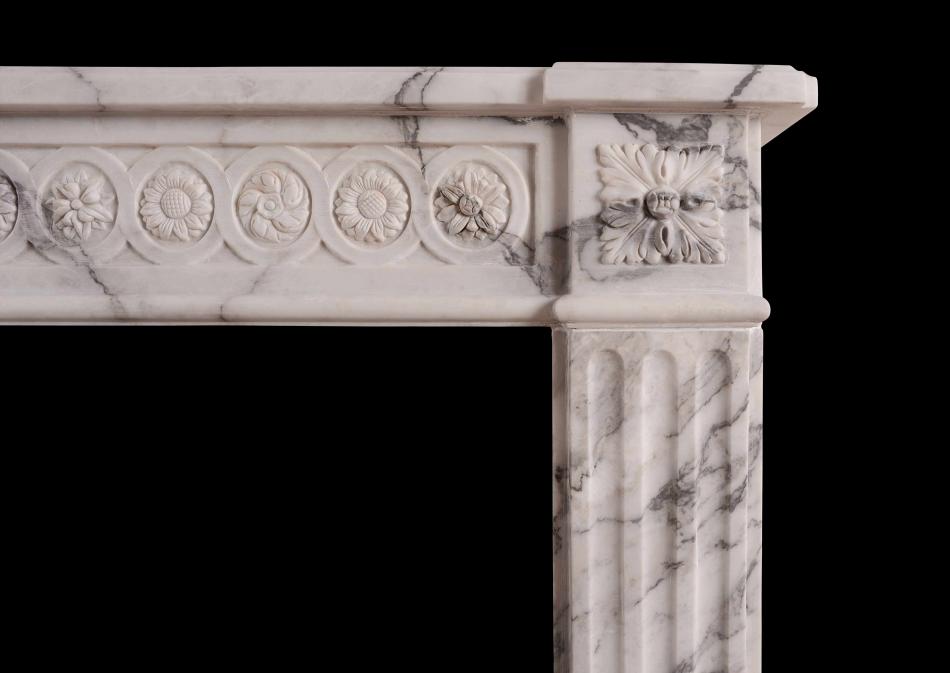 An Italian Arabescato French Louis XVI marble fireplace