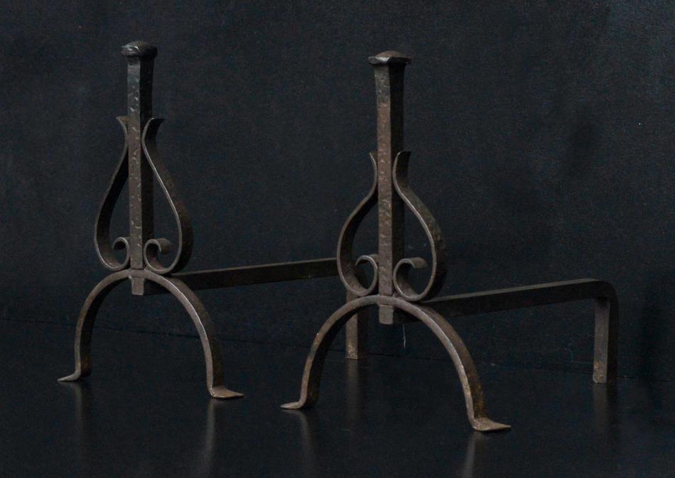 A set of wrought iron firedogs