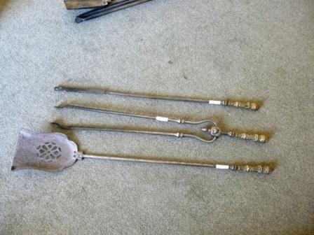 A set of 19th century steel and brass firetools