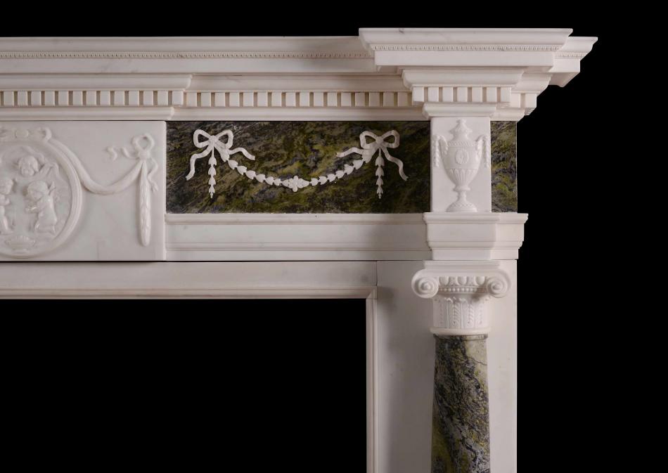 A Statuary marble fireplace with Connemara columns