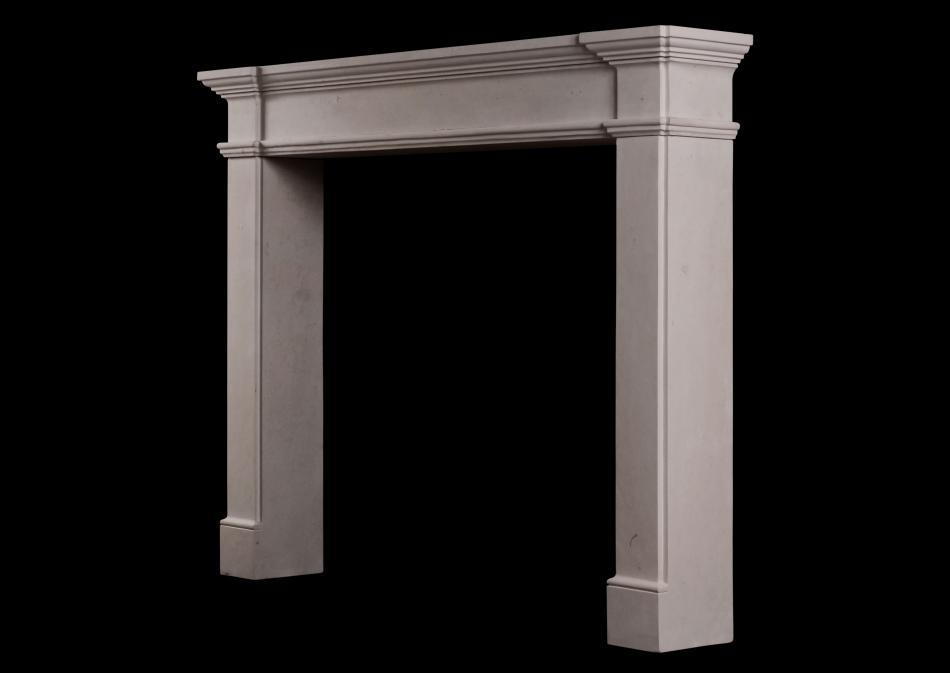 An architectural French limestone fireplace