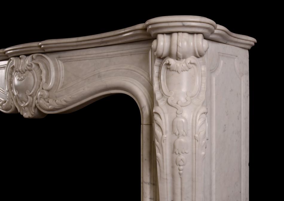 A French marble fireplace in the Louis XV style